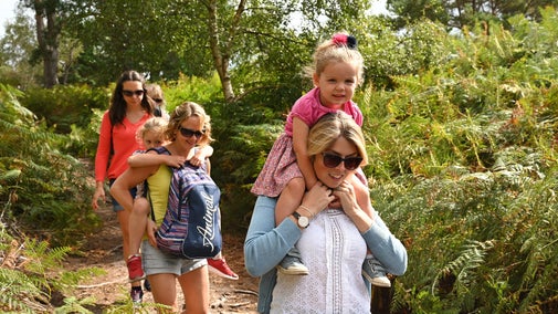Visitors walking at Brownsea Island, Dorset